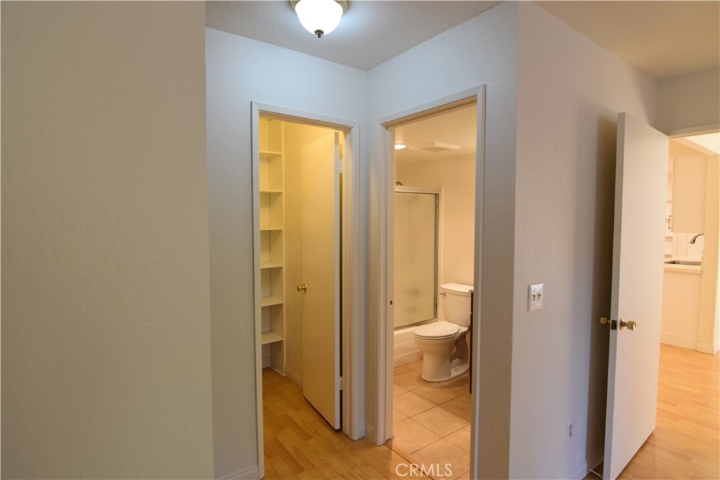 20702 El Toro Road, Unit 168 Lake Forest, CA 92630 - Photo 11 of 16 a bathroom with a glass shower door