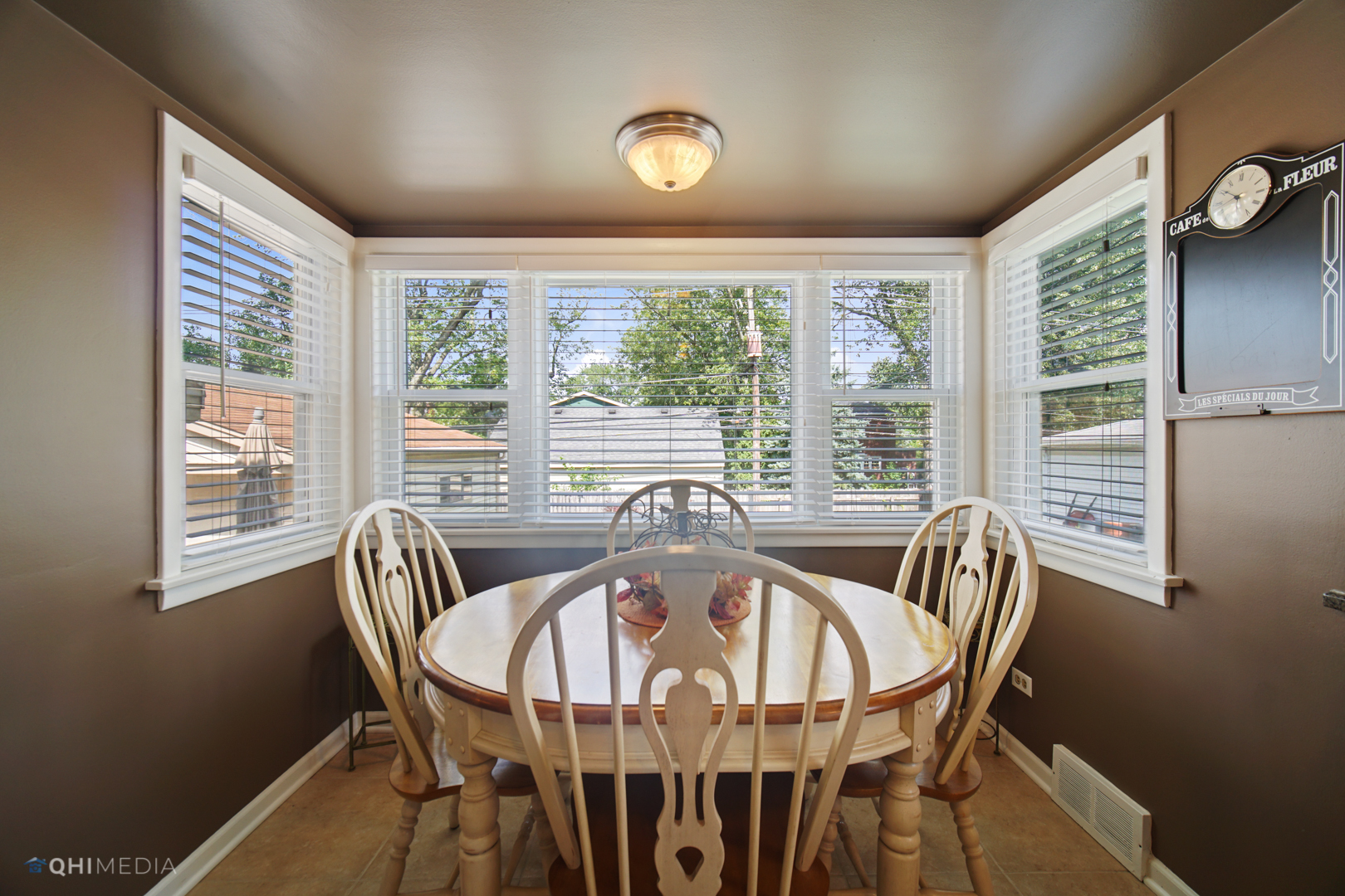 1730 Evergreen Road Homewood, IL 60430 - Photo 8 of 22 a view of a dining room with furniture window and outside view