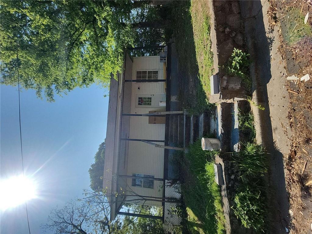 5 Ross Street Northeast Rome, GA 30161 - Photo 1 of 9 a front view of a house with a yard