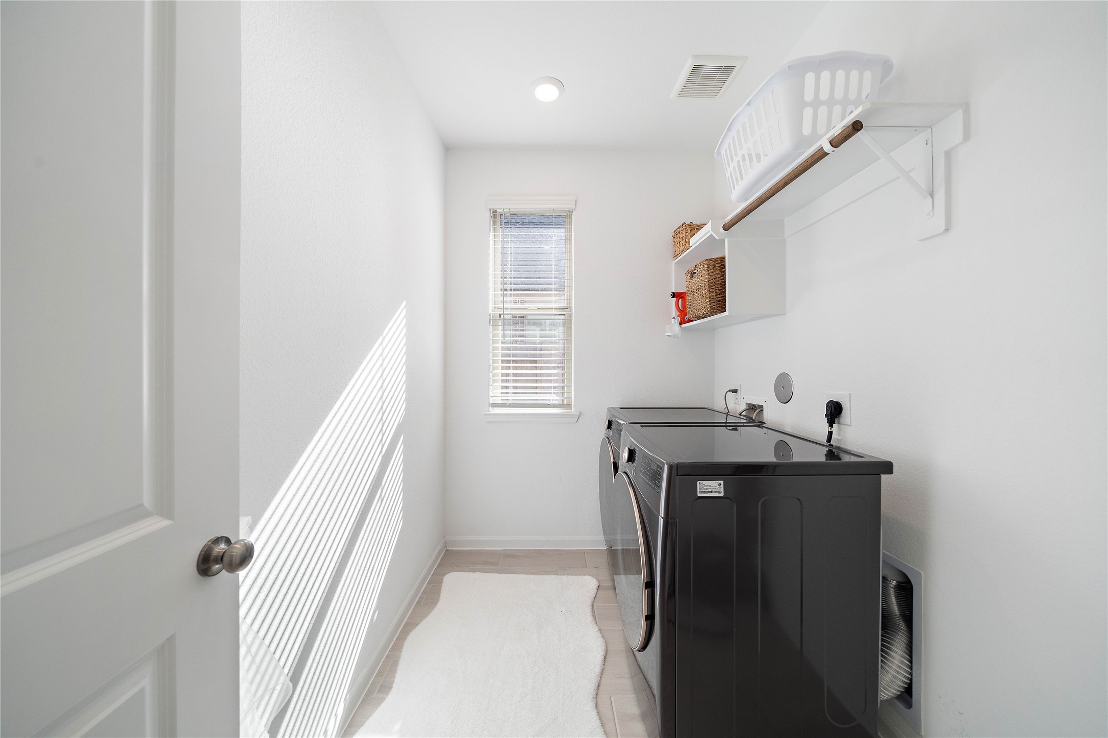 2239 Ginger Trail Lane Rosenberg, TX 77469 - Photo 12 of 35 a utility room with a washer and dryer