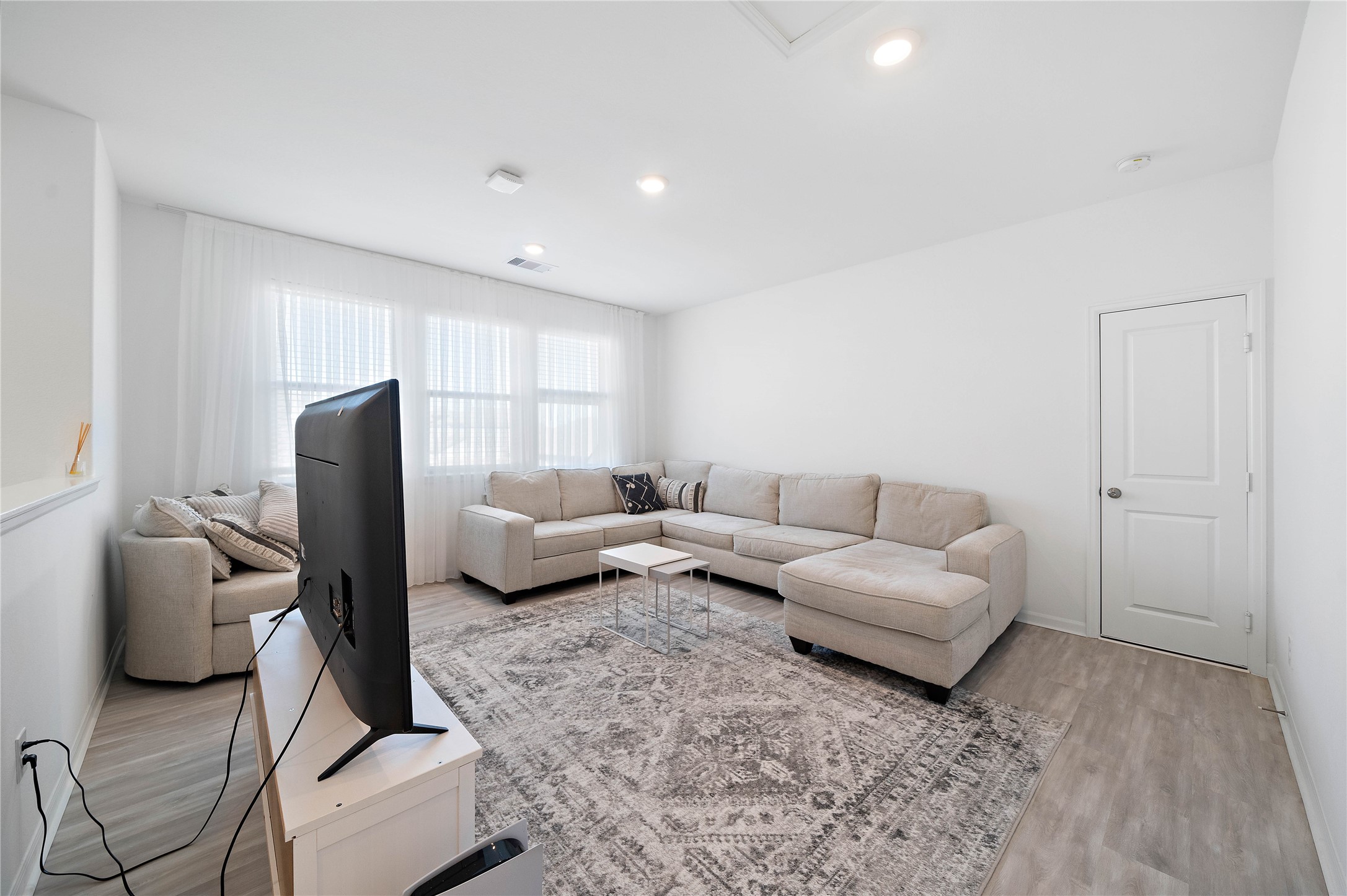 2239 Ginger Trail Lane Rosenberg, TX 77469 - Photo 28 of 35 a living room with furniture and a couch