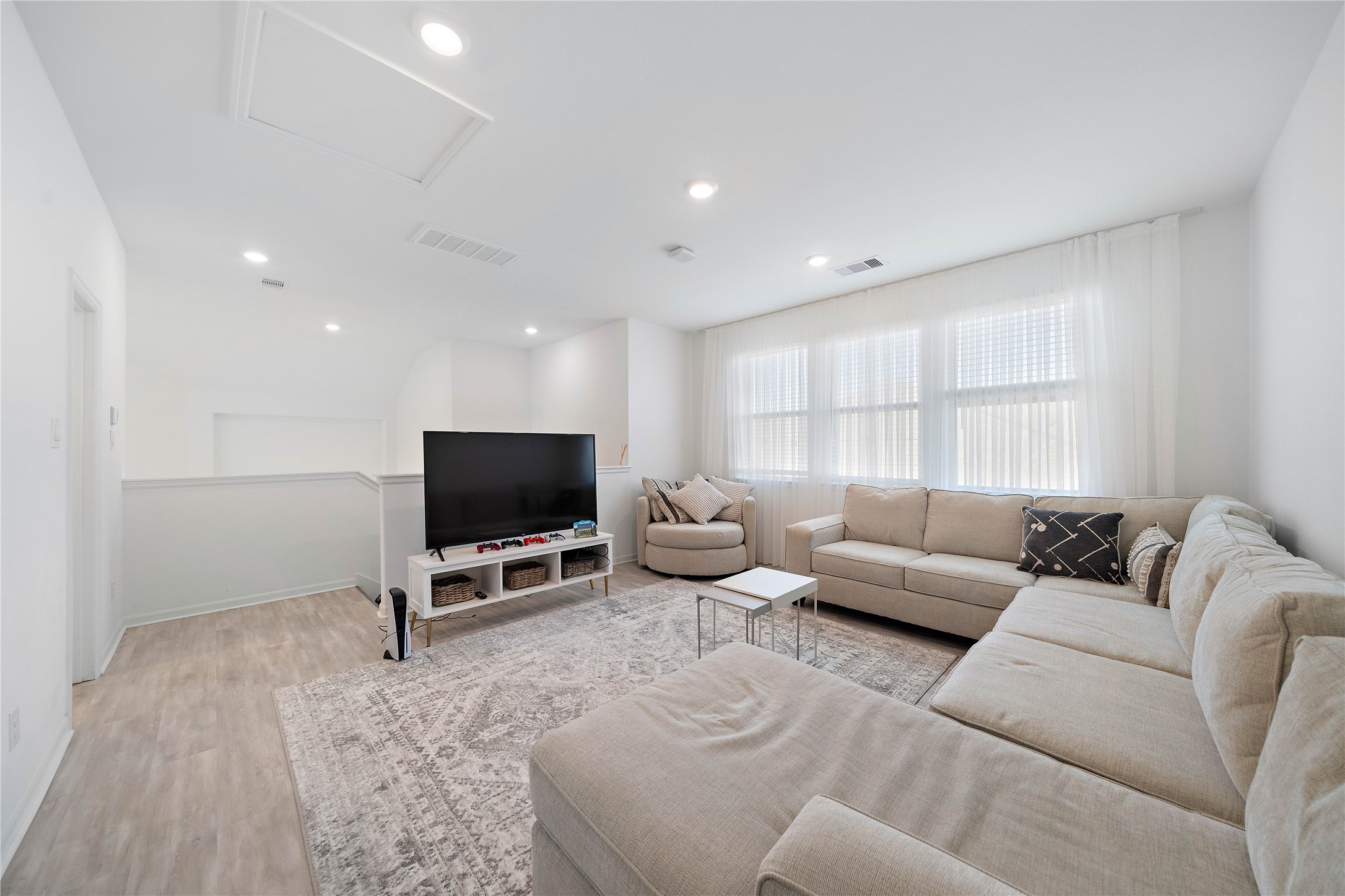 2239 Ginger Trail Lane Rosenberg, TX 77469 - Photo 29 of 35 a living room with furniture and a flat screen tv