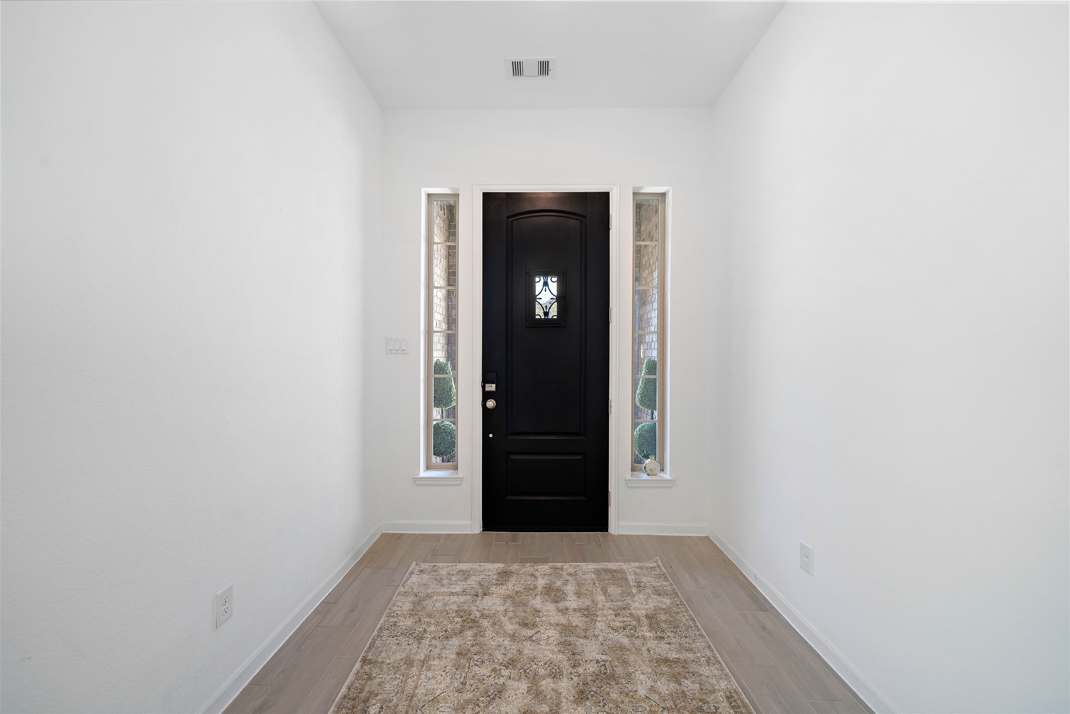 2239 Ginger Trail Lane Rosenberg, TX 77469 - Photo 7 of 35 a view of an empty room with closet and entryway