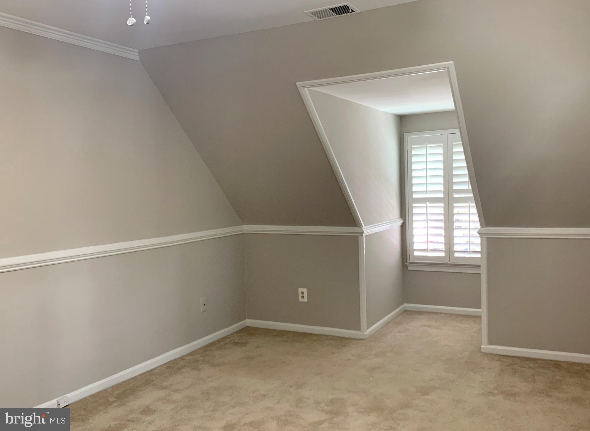 5606 Light Infantry Drive Burke, VA 22015 - Photo 26 of 66 an empty room with windows