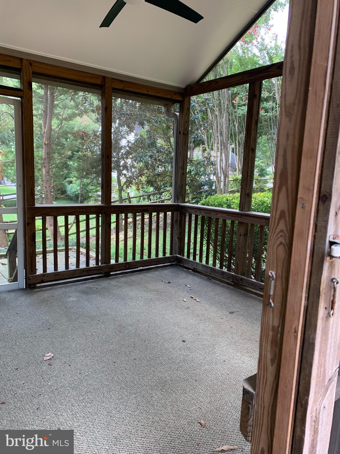 5606 Light Infantry Drive Burke, VA 22015 - Photo 51 of 66 a view of a room with wooden floor and windows