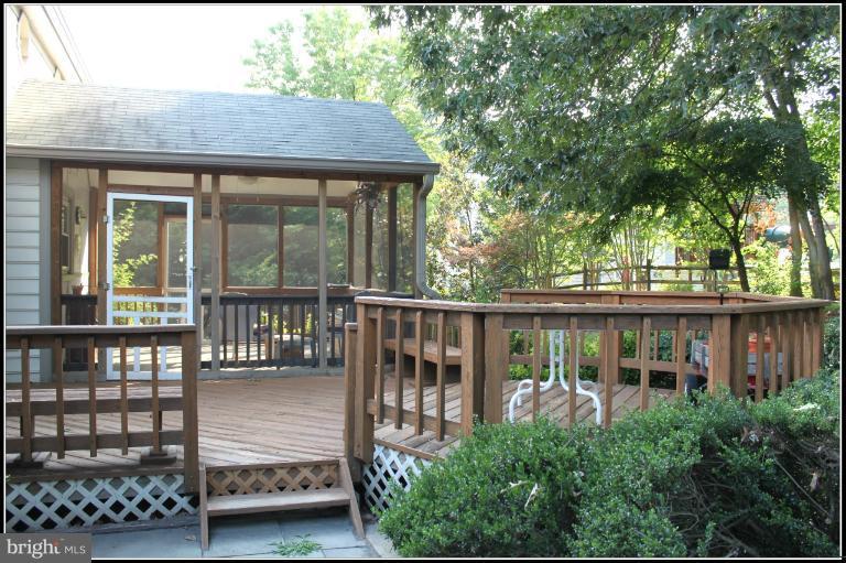 5606 Light Infantry Drive Burke, VA 22015 - Photo 52 of 66 a view of a wooden house with a large window