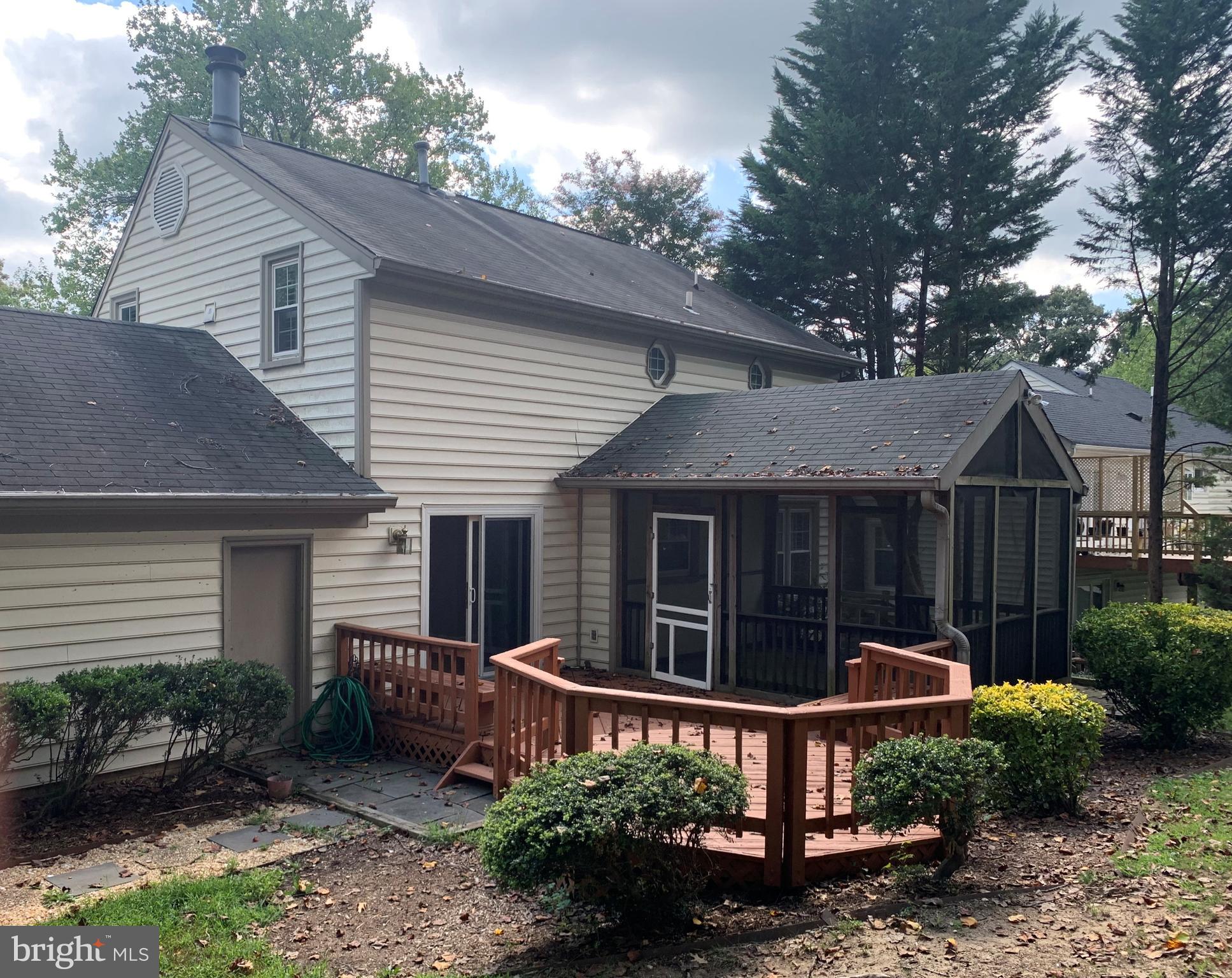 5606 Light Infantry Drive Burke, VA 22015 - Photo 59 of 66 a view of a house with backyard and sitting area