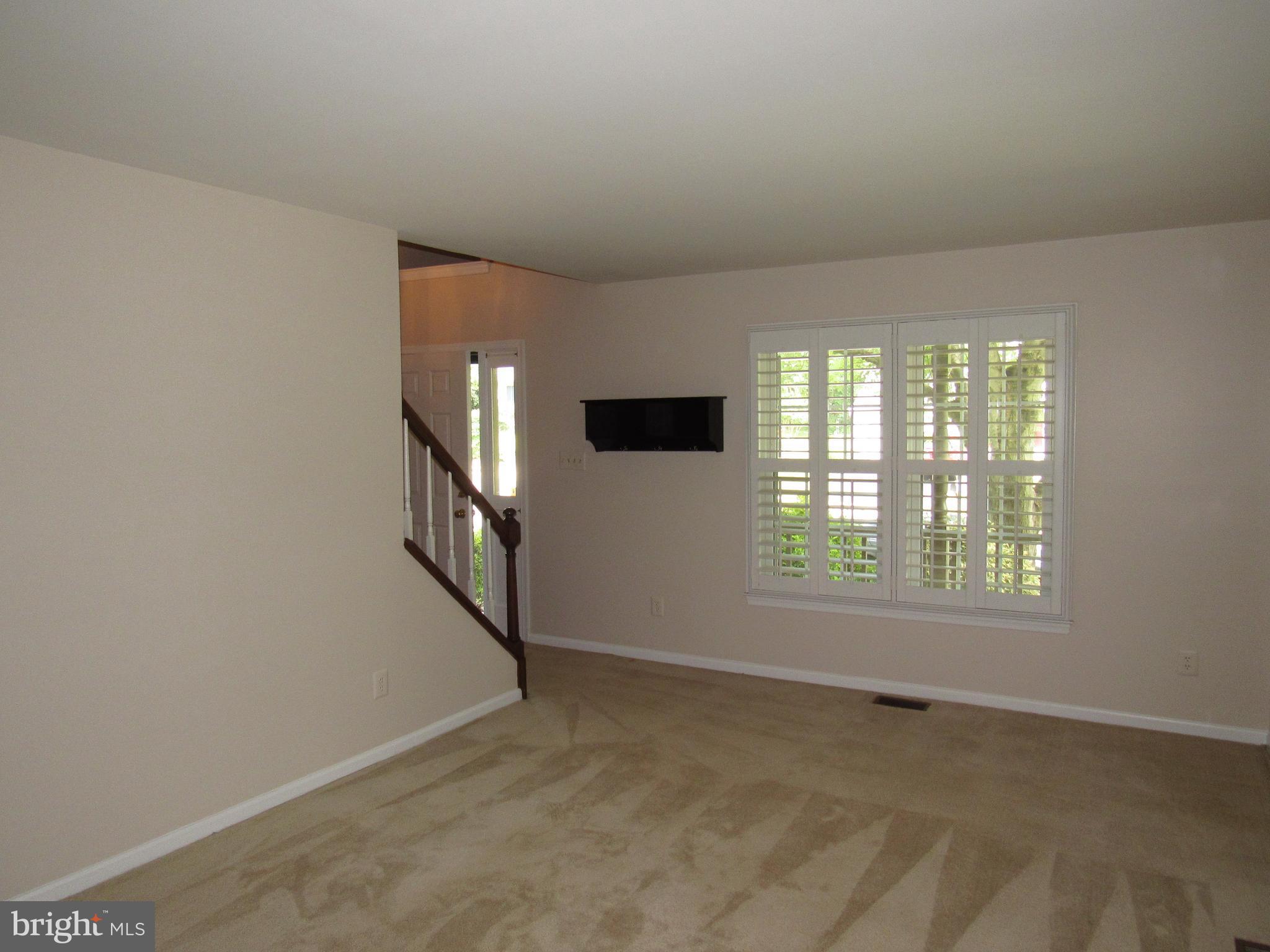 5606 Light Infantry Drive Burke, VA 22015 - Photo 8 of 66 a view of an empty room with a window