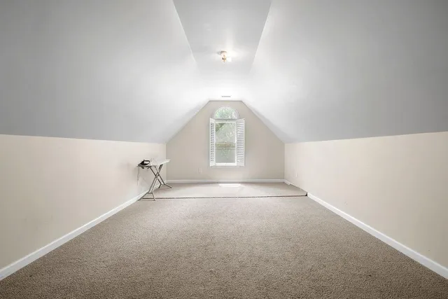 a bathroom with a sink double vanity and a mirror