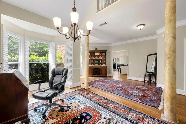 a view of a livingroom with furniture and window