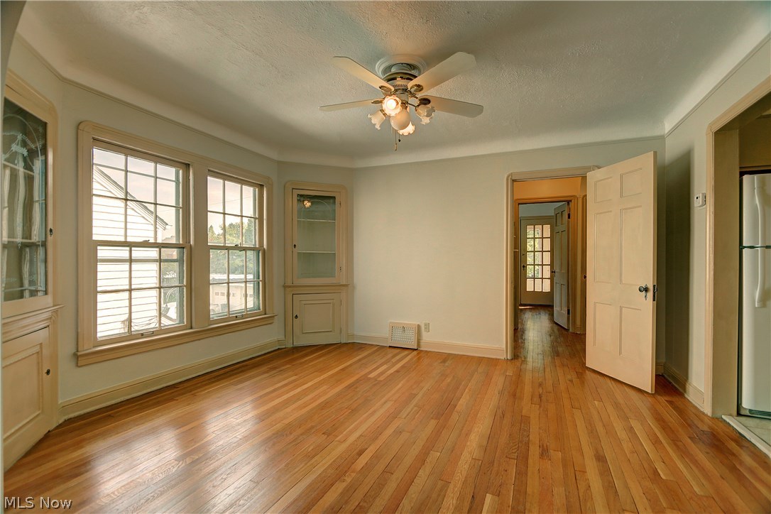 3697 Winchell Road Beachwood, OH 44122 - Photo 15 of 22 Upper unit dining room with hardwood floor and corner built-ins