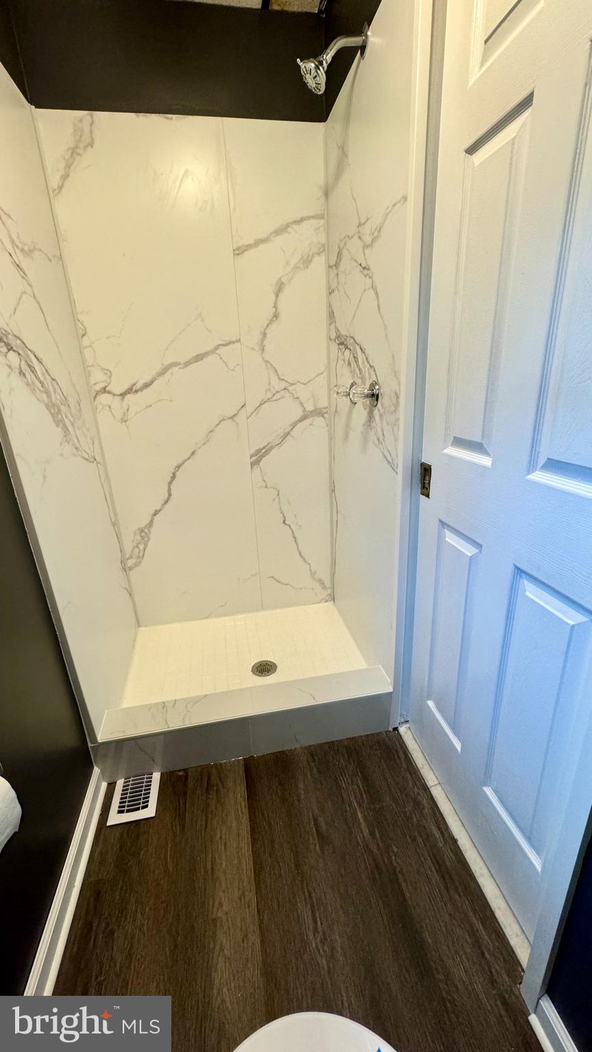 5910 Hamilton Avenue, Unit 3 Baltimore, MD 21237 - Photo 2 of 5 a view of wooden floor