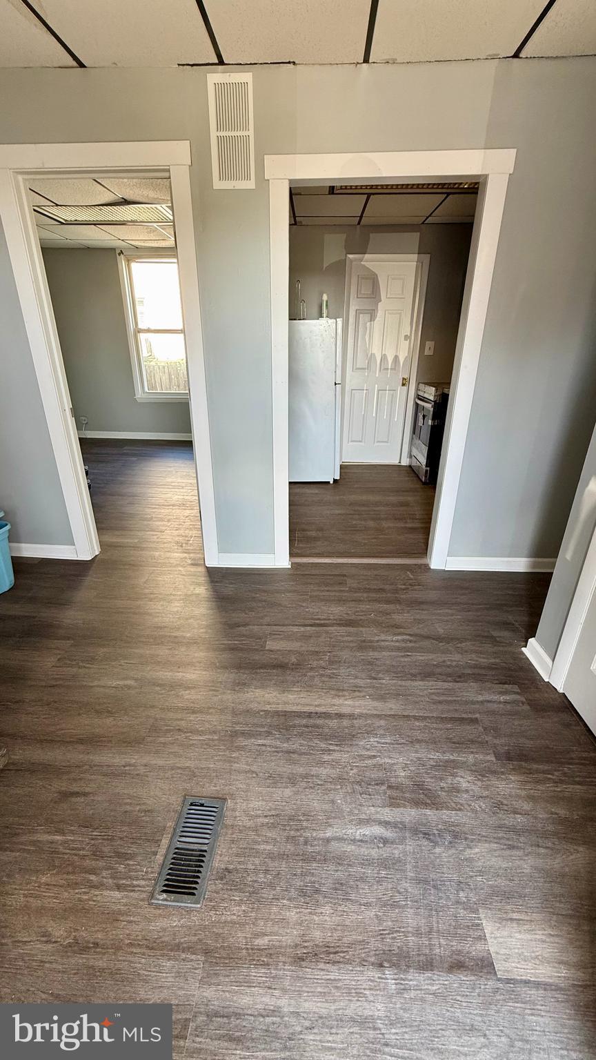 5910 Hamilton Avenue, Unit 3 Baltimore, MD 21237 - Photo 5 of 5 a view of entryway and hall with wooden floor