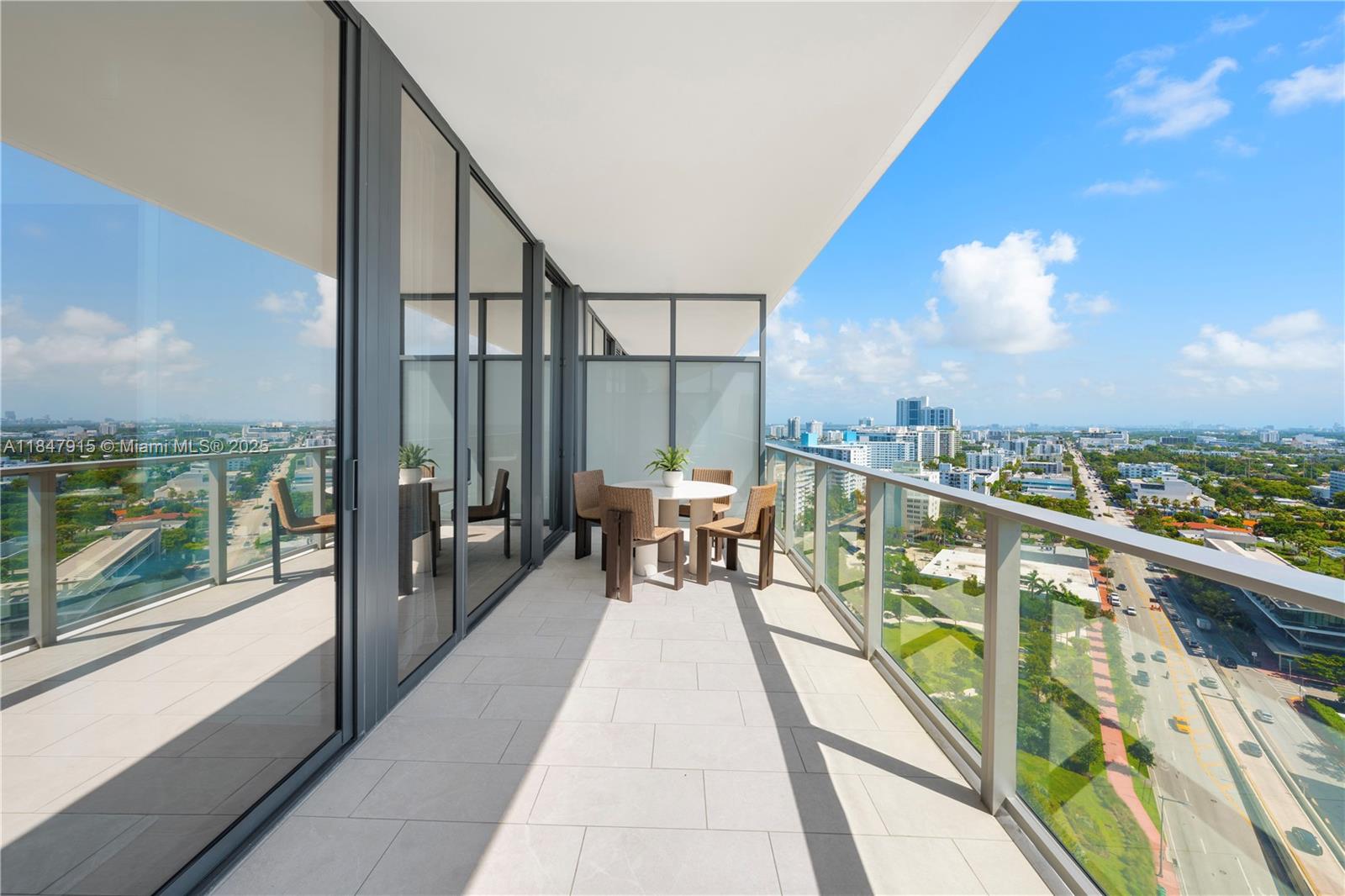 500 Alton Road, Unit 2008 Miami Beach, FL 33139 - Photo 12 of 48 a balcony with furniture and city view