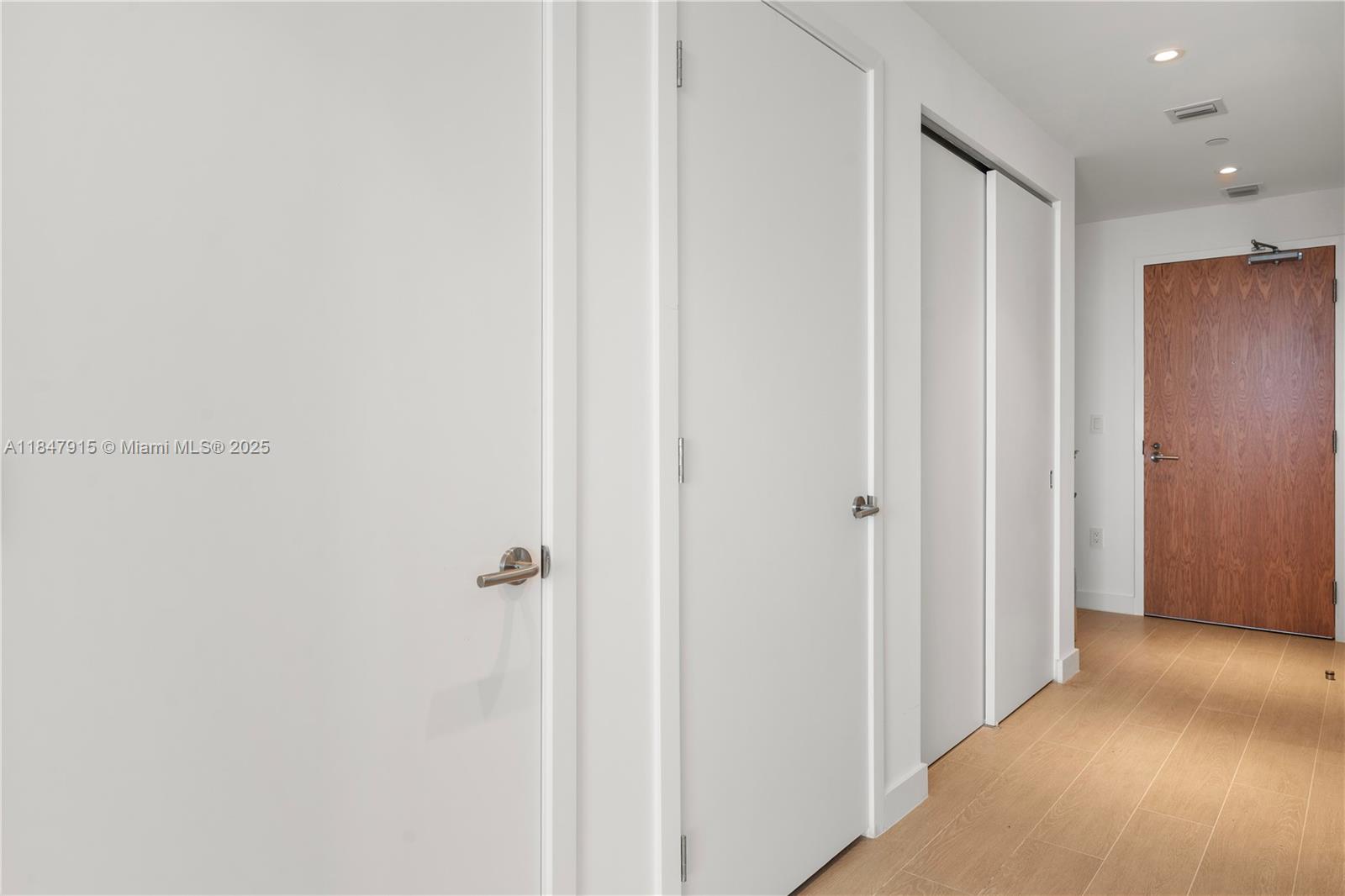 500 Alton Road, Unit 2008 Miami Beach, FL 33139 - Photo 15 of 48 a view of a hallway with closet area