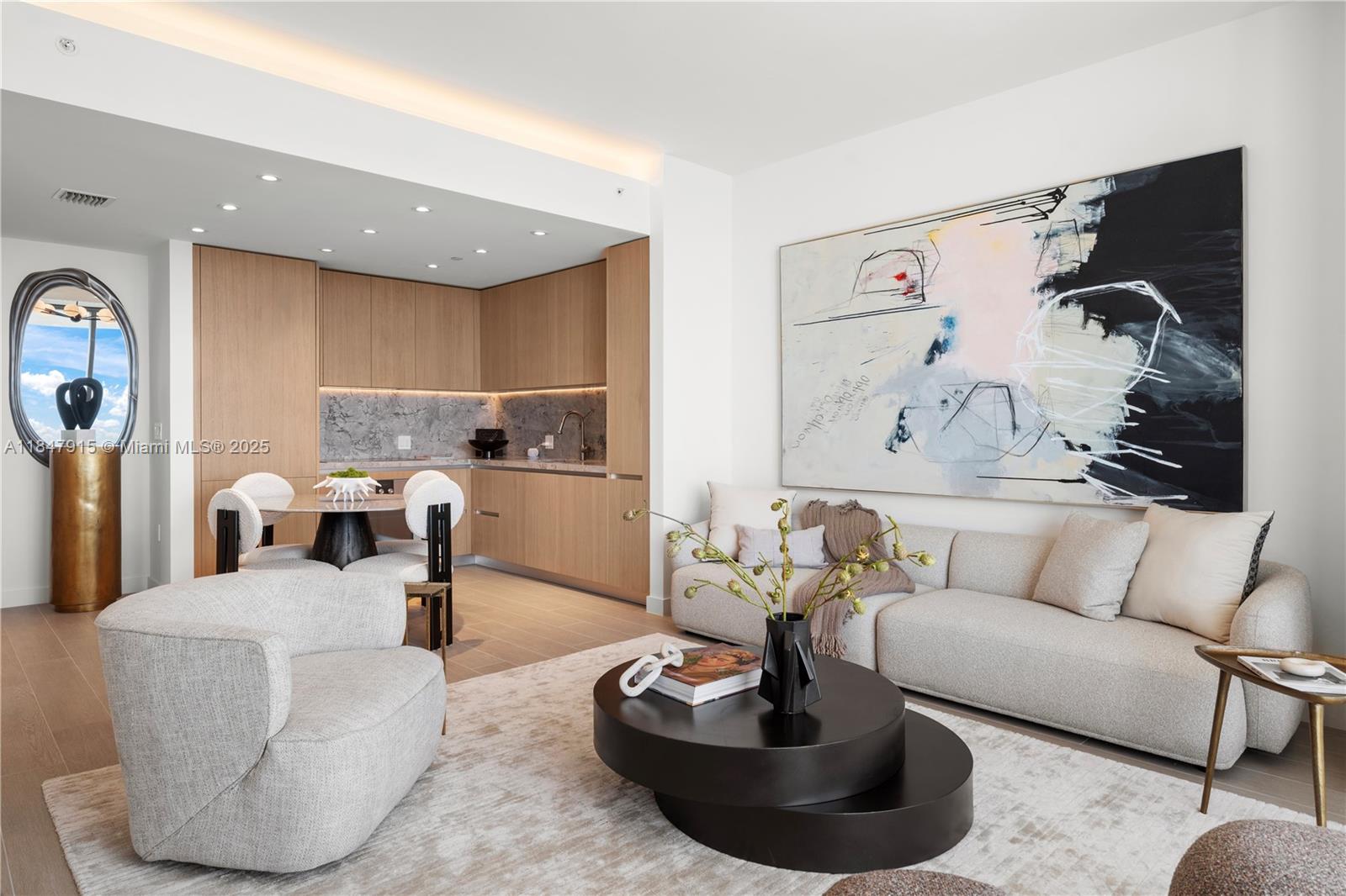500 Alton Road, Unit 2008 Miami Beach, FL 33139 - Photo 2 of 48 a living room with furniture and a potted plant