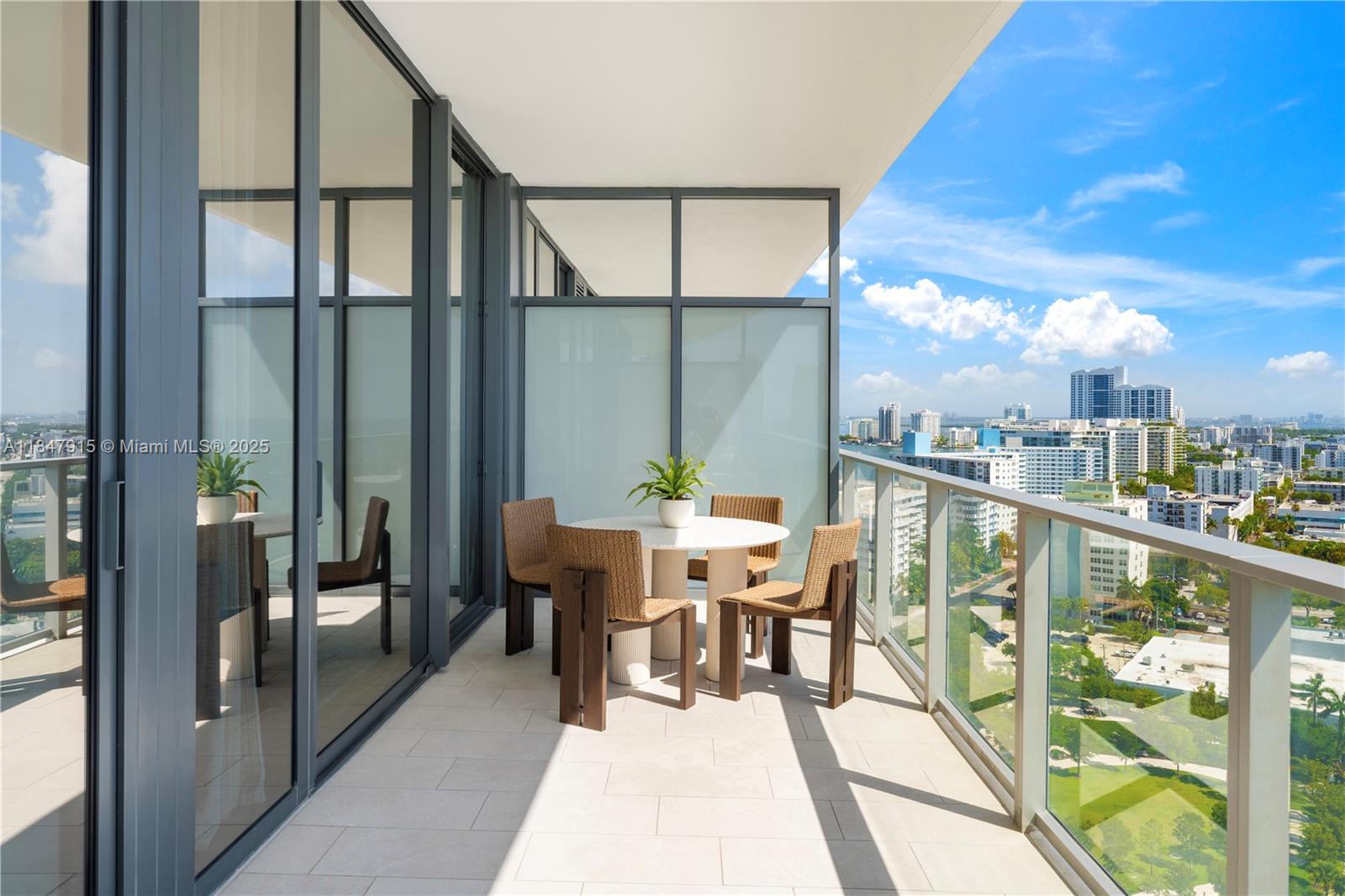 500 Alton Road, Unit 2008 Miami Beach, FL 33139 - Photo 22 of 48 a view of a balcony with chairs