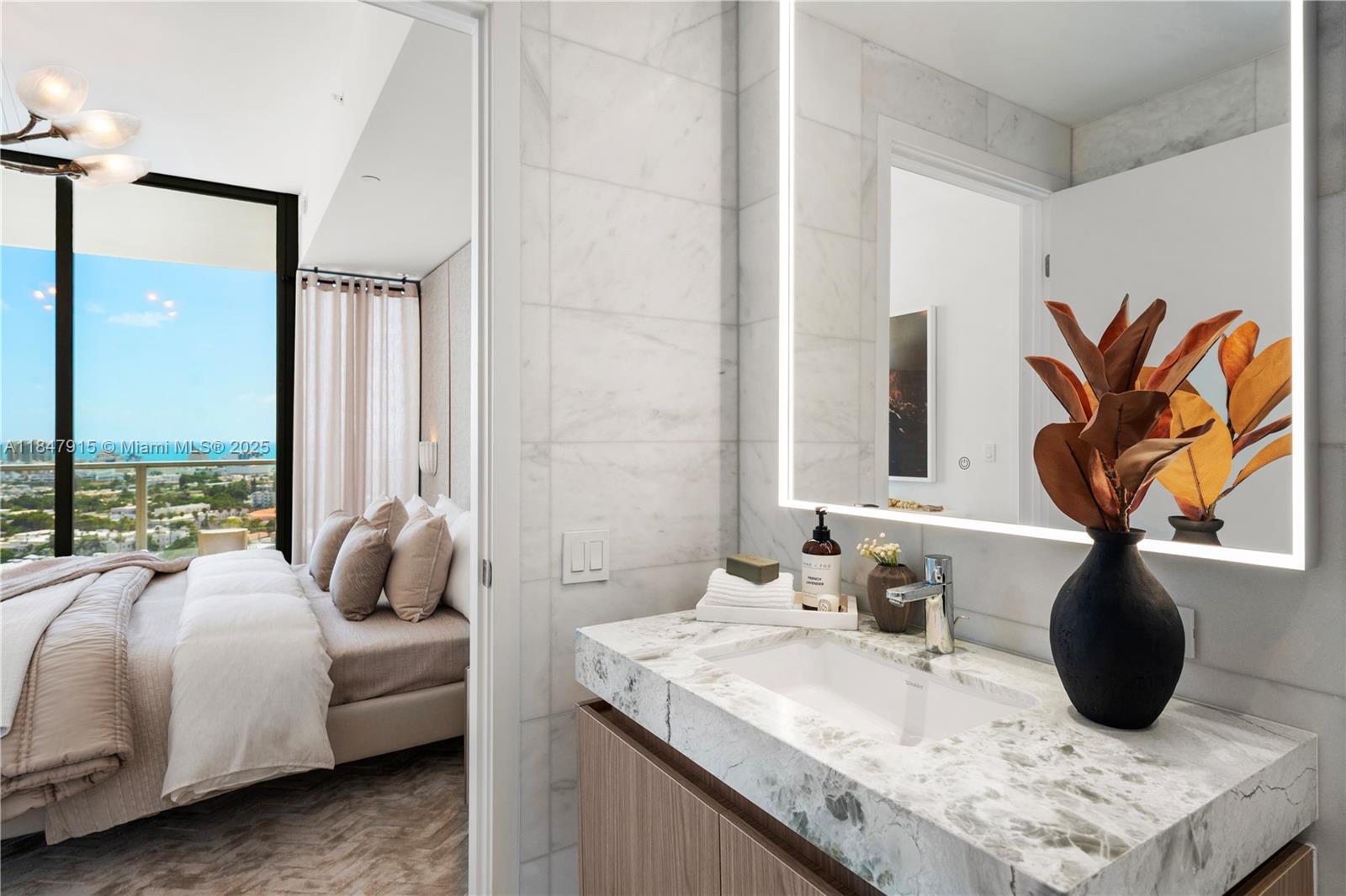 500 Alton Road, Unit 2008 Miami Beach, FL 33139 - Photo 32 of 48 a bedroom with a bed and a window