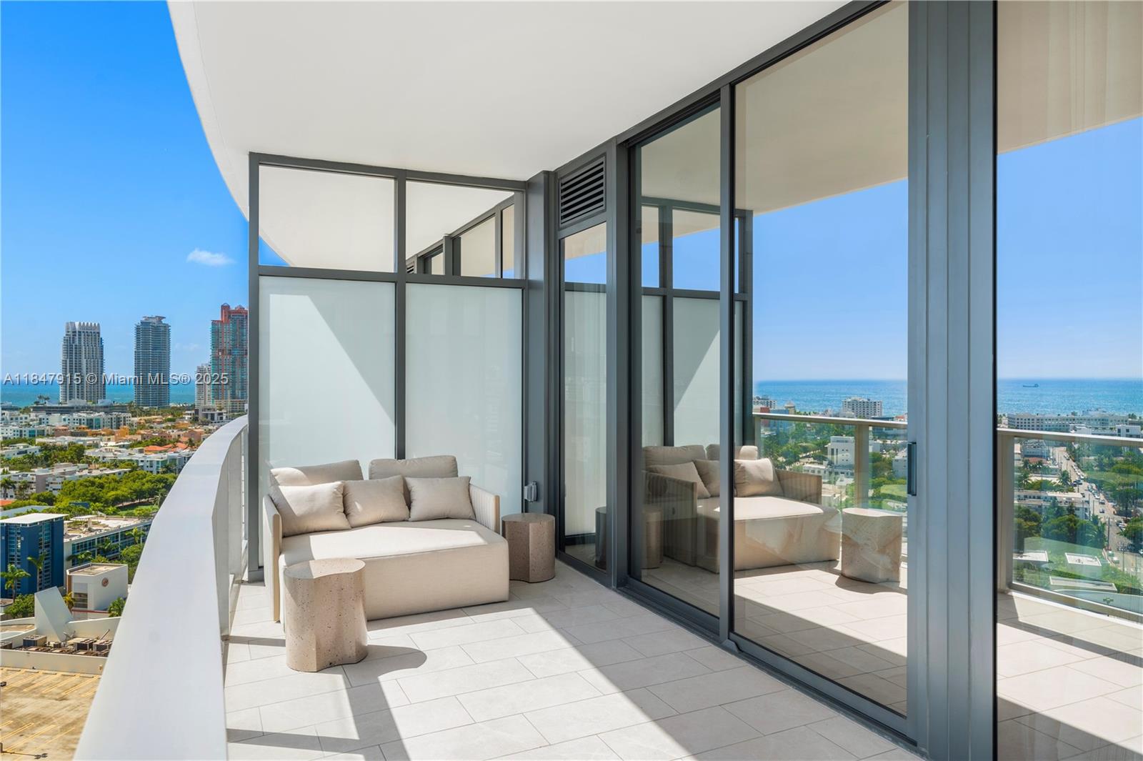 500 Alton Road, Unit 2008 Miami Beach, FL 33139 - Photo 8 of 48 a bedroom with furniture and a floor to ceiling window