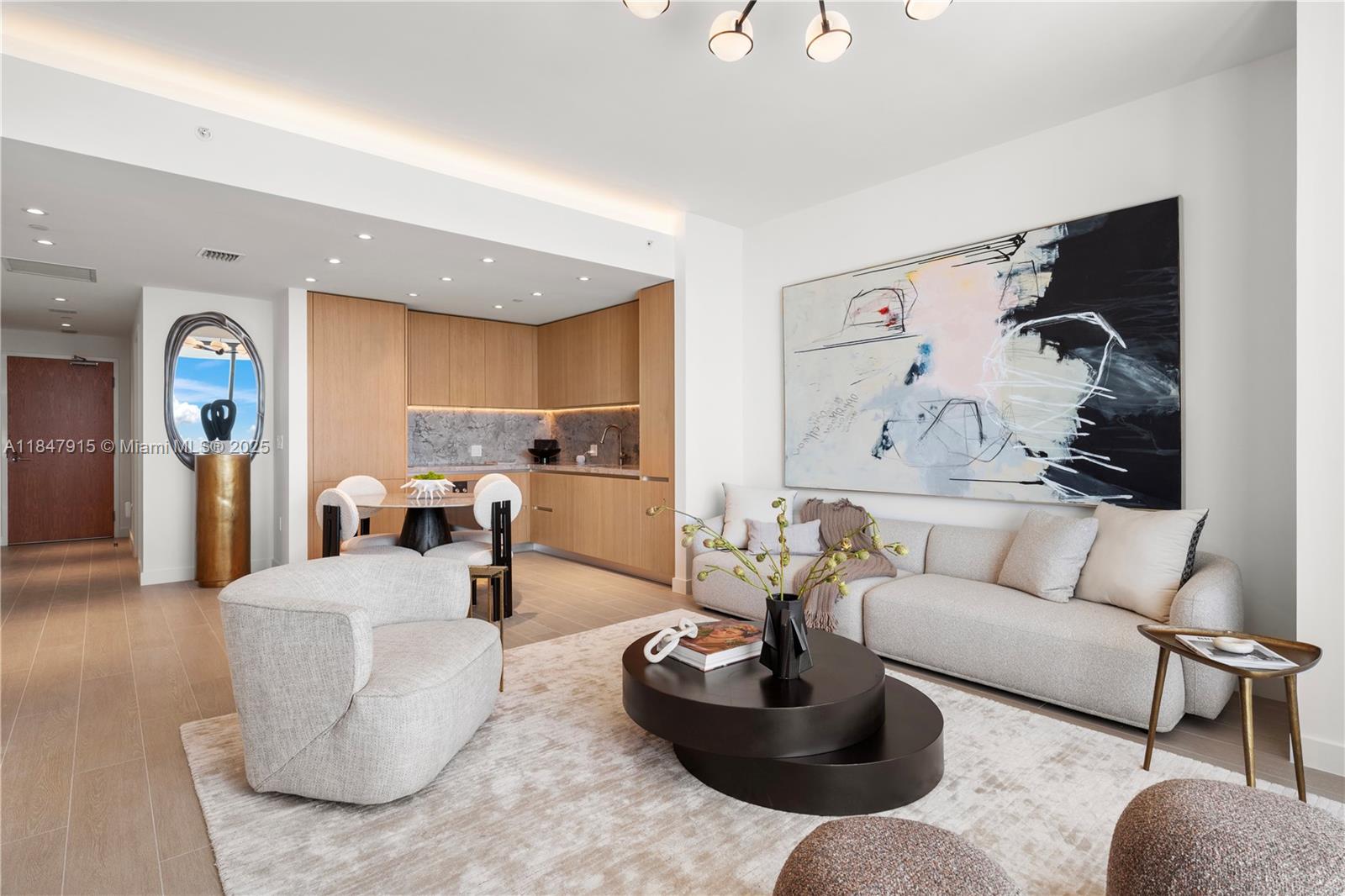 500 Alton Road, Unit 2008 Miami Beach, FL 33139 - Photo 10 of 48 a living room with furniture and a painting