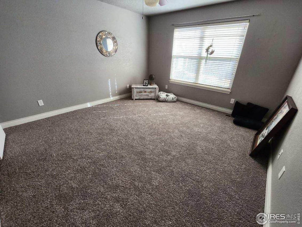 301 Amber Drive Windsor, CO 80550 - Photo 13 of 25 Primary Bedroom