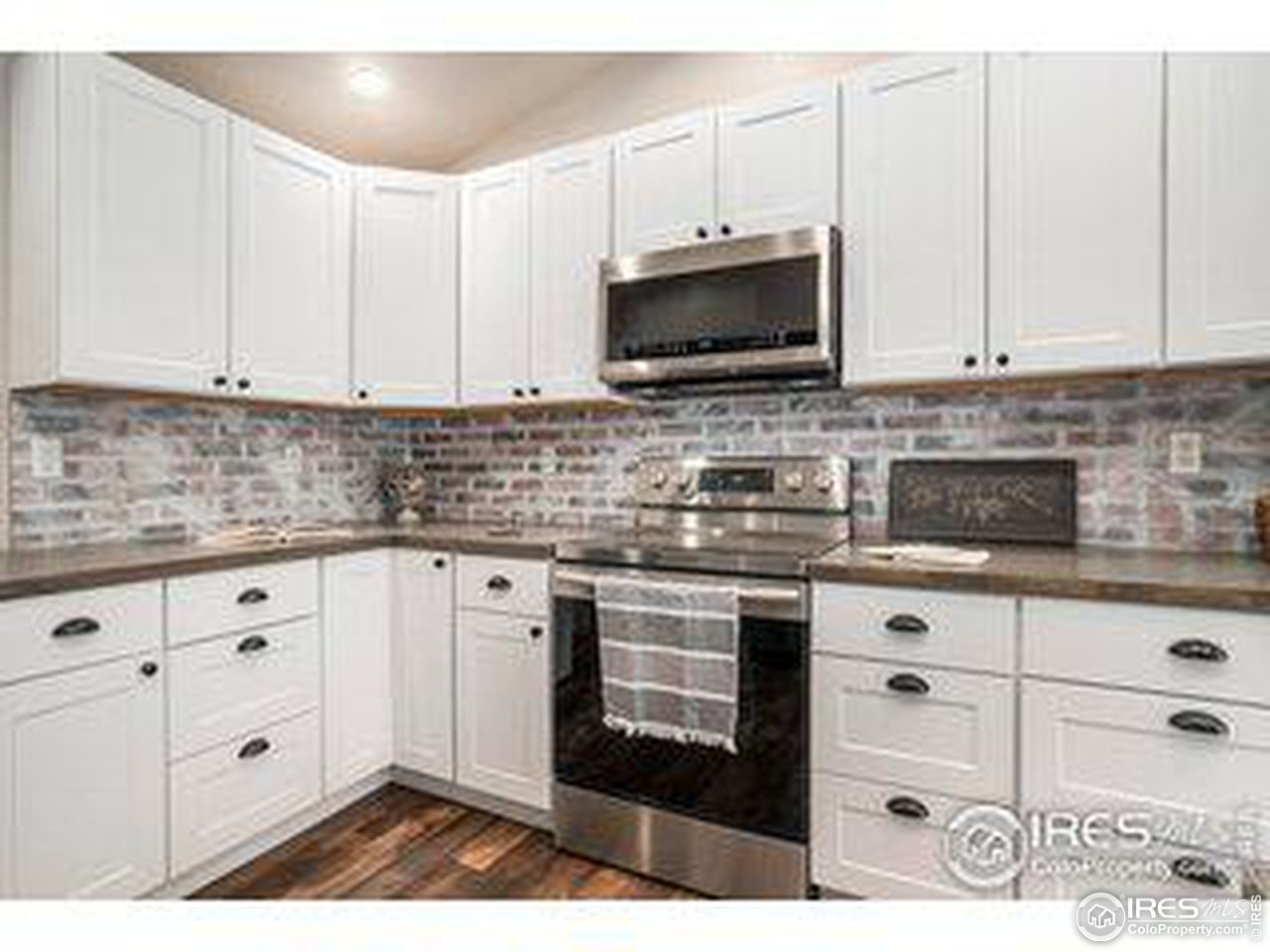 301 Amber Drive Windsor, CO 80550 - Photo 6 of 25 Updated Kitchen