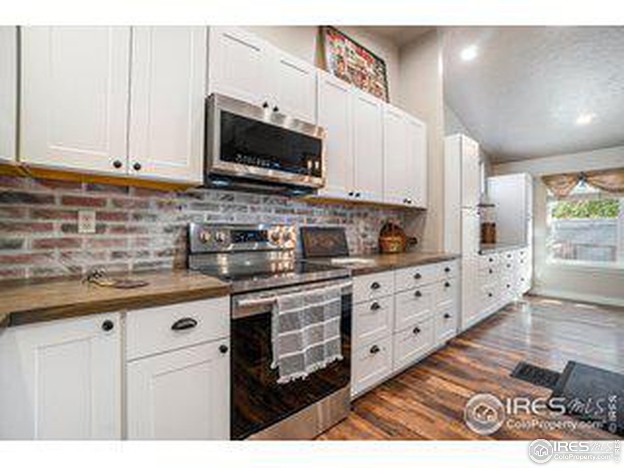 301 Amber Drive Windsor, CO 80550 - Photo 7 of 25 Beautiful updated Kitchen