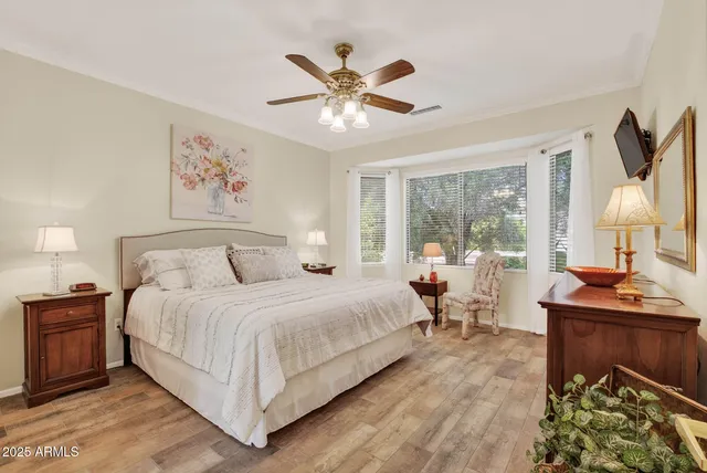 a kitchen with granite countertop a stove top oven microwave and cabinets