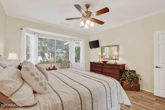 a bedroom with a bed and furniture