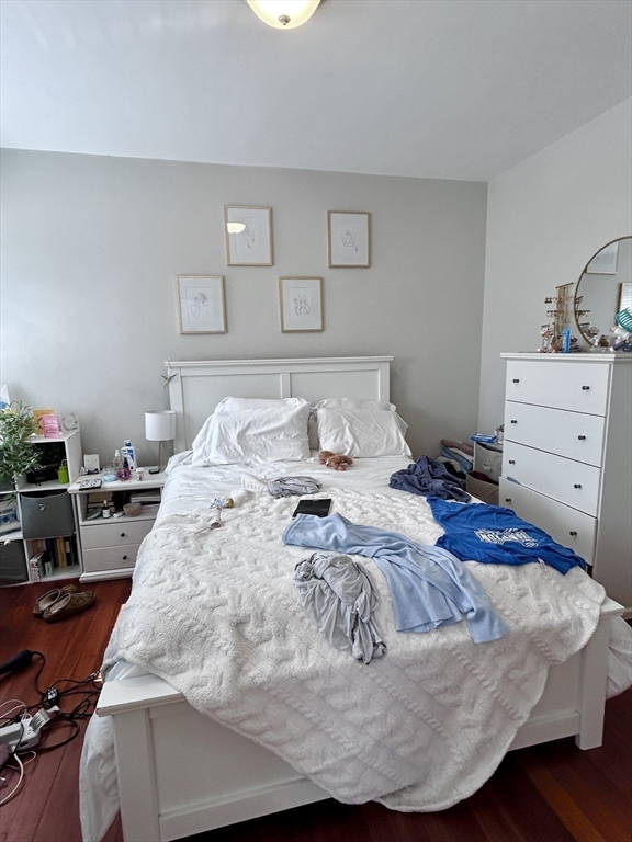 805 Washington Street, Unit 2 Brookline, MA 02446 - Photo 11 of 20 a bedroom with a bed and window