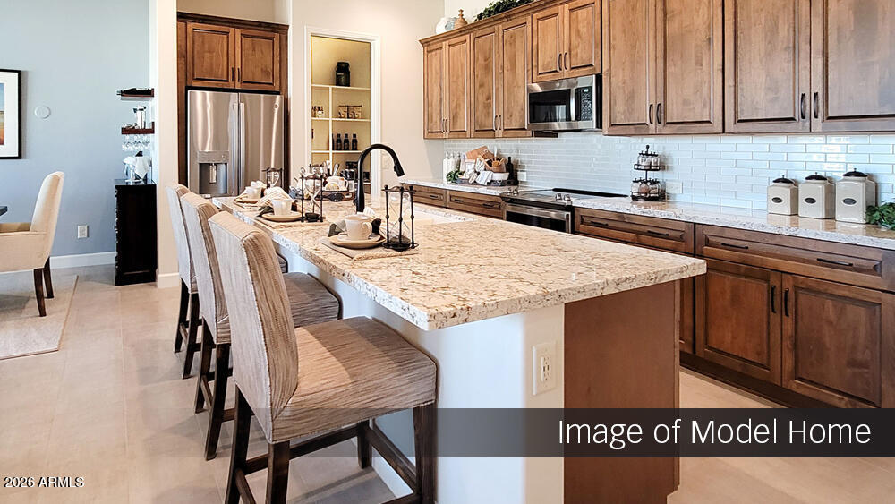 3237 North 168th Avenue Goodyear, AZ 85395 - Photo 3 of 22 Napa Model Kitchen 1