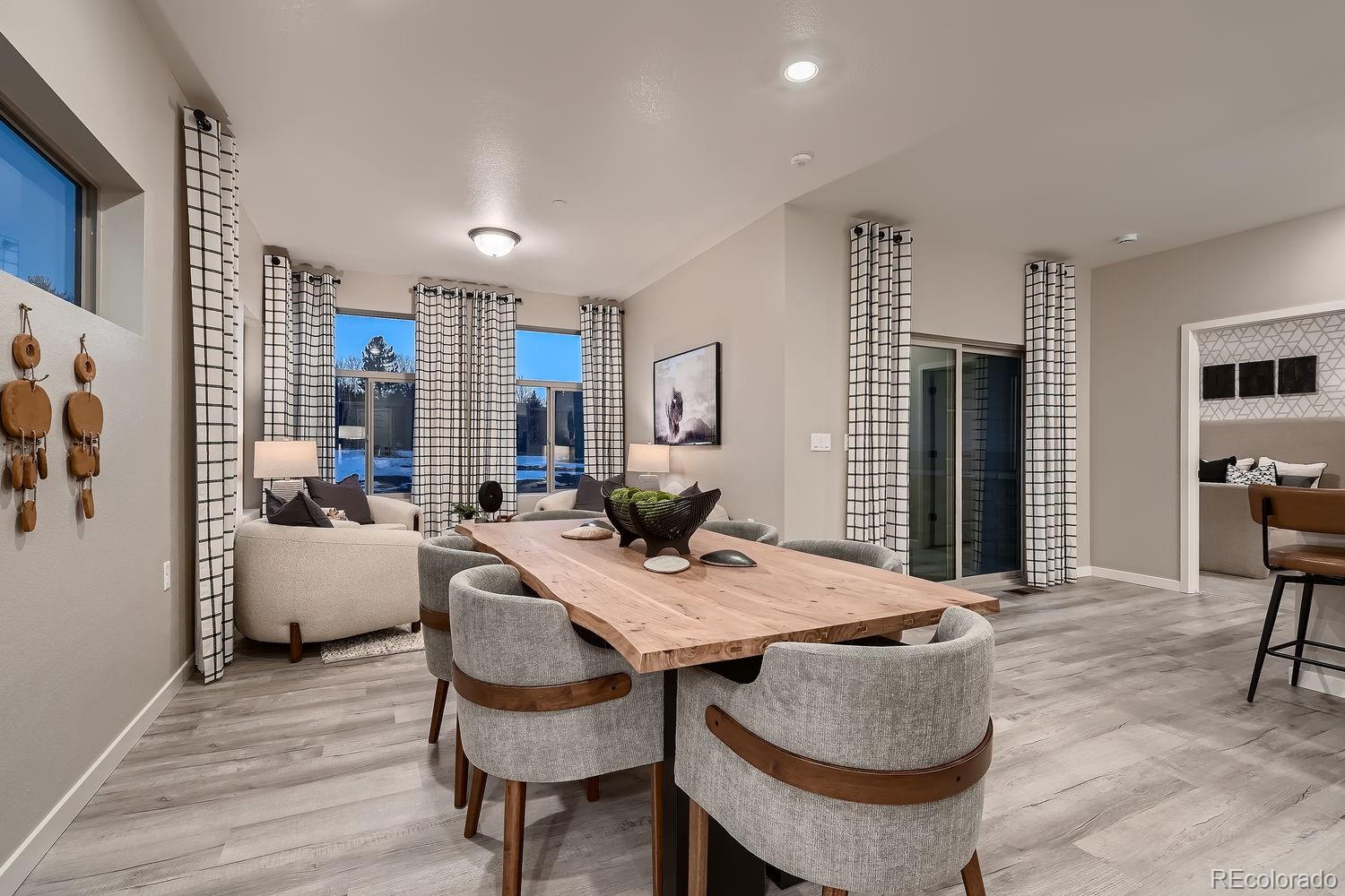 12880 Inca Street Westminster, CO 80234 - Photo 19 of 50 a view of a dining room with furniture and window