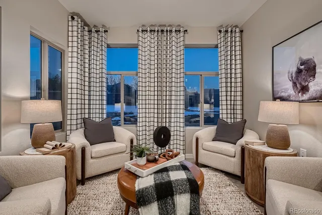 a living room with furniture and a couch