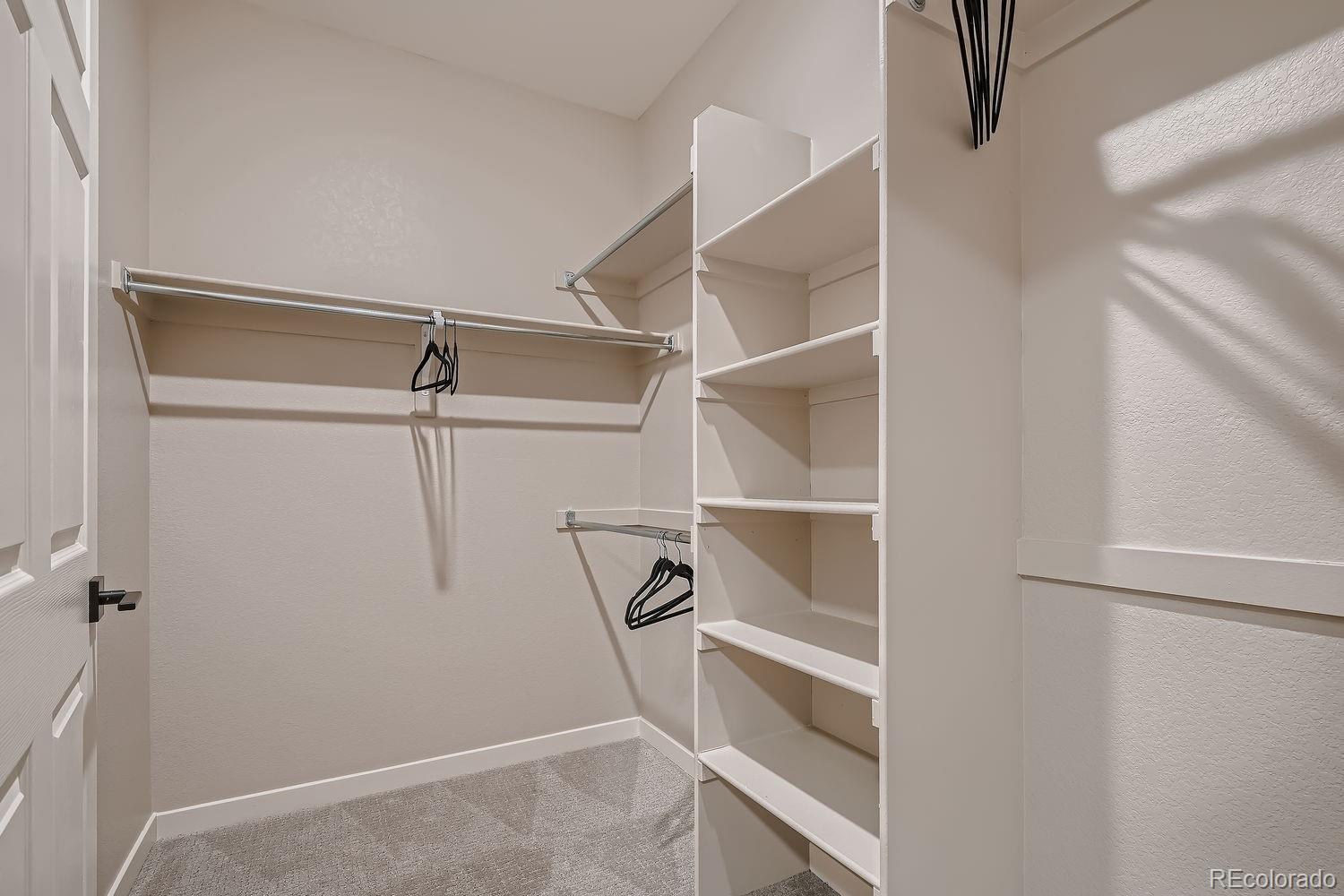 12880 Inca Street Westminster, CO 80234 - Photo 45 of 50 a view of an empty walk in closet