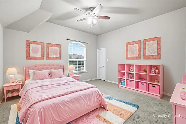 a bedroom with a bed and a cabinets
