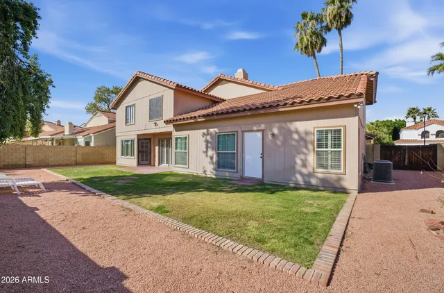 a view of a yard in front of a house