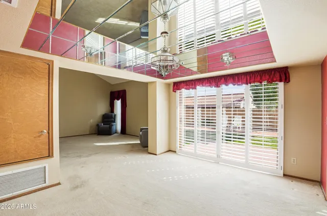 a view of a room with windows