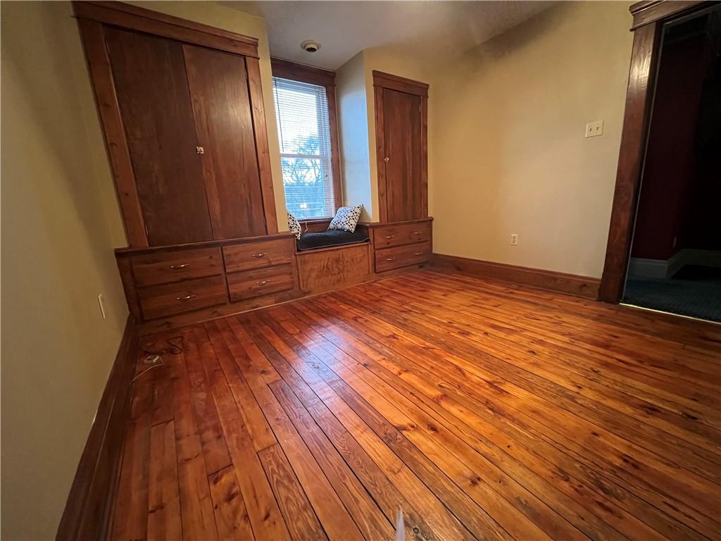 481 Heller Street Rochester, PA 15074 - Photo 15 of 24 a view of empty room with wooden floor and fan