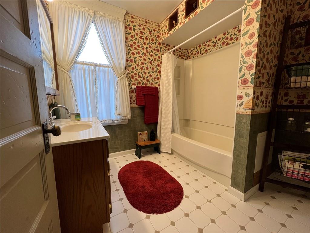 481 Heller Street Rochester, PA 15074 - Photo 16 of 24 a bathroom with a sink toilet and shower
