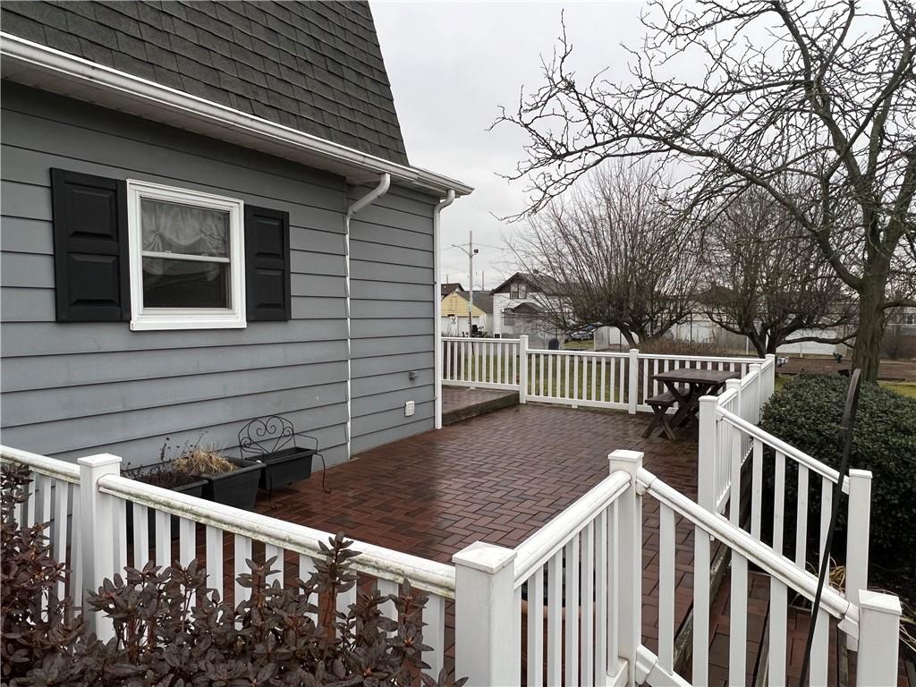 481 Heller Street Rochester, PA 15074 - Photo 21 of 24 a view of a house with backyard and wooden fence