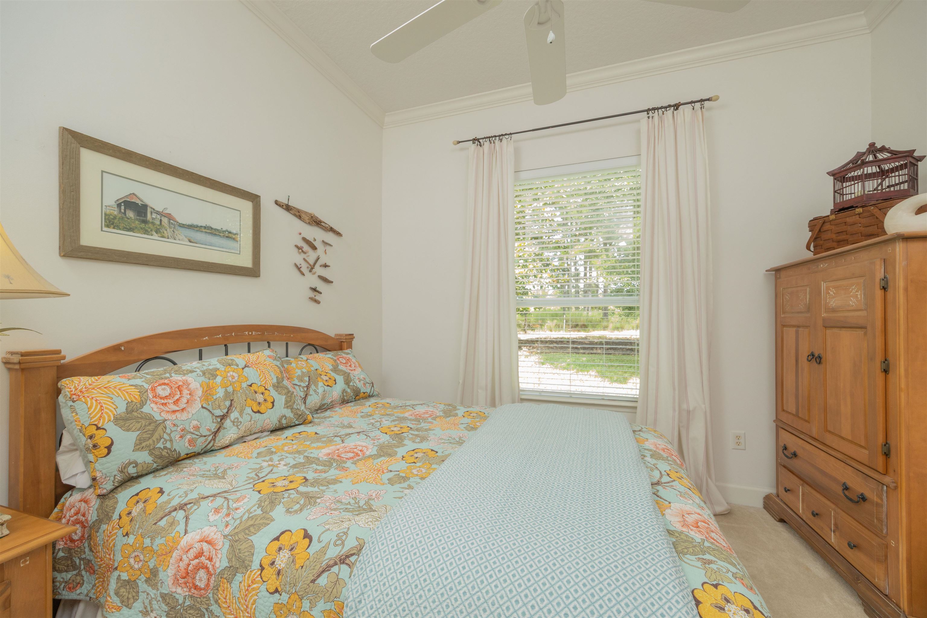 1160 Inverness Drive St. Augustine, FL 32092 - Photo 44 of 77 a bedroom with a bed and a window