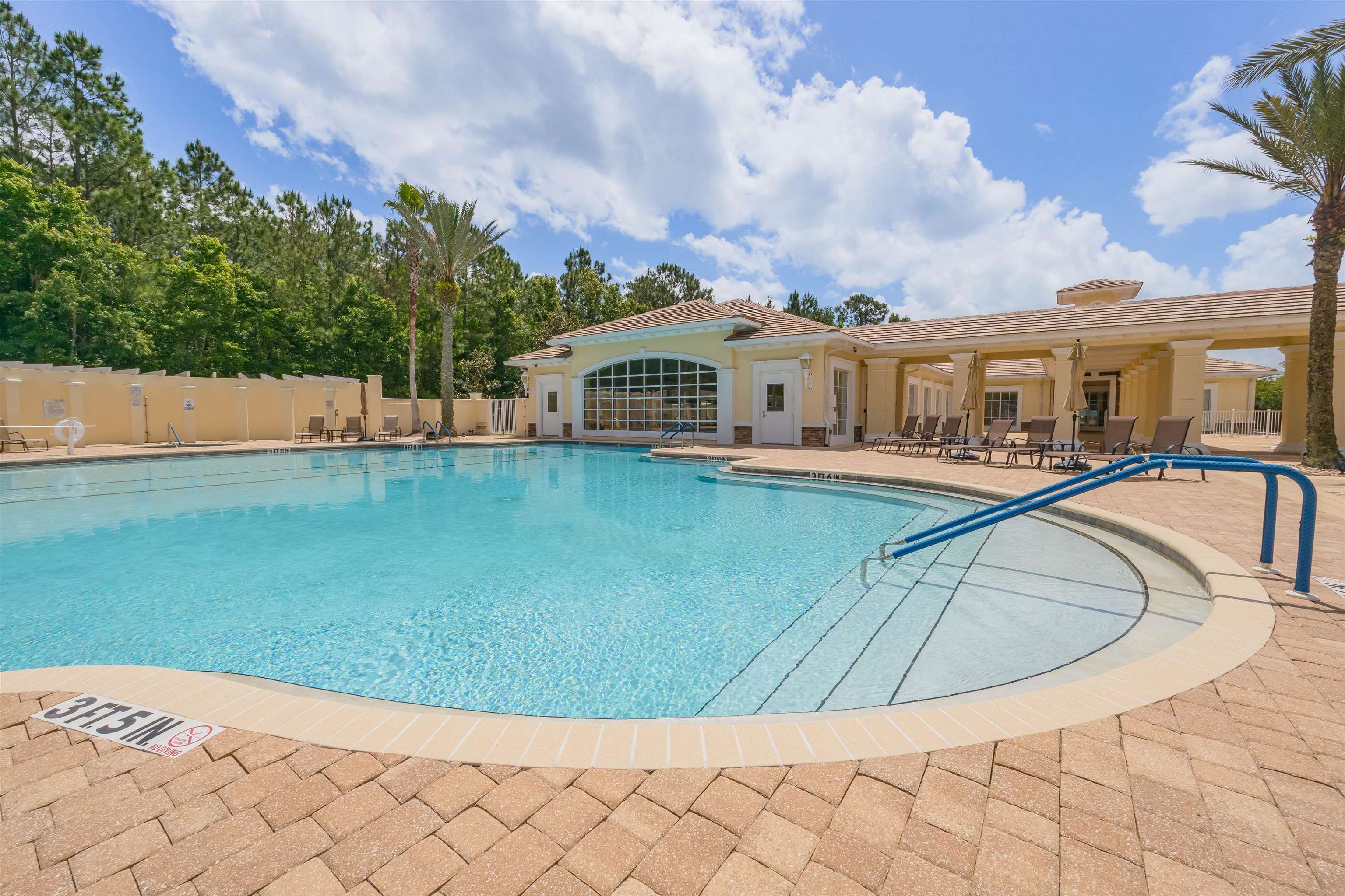 1160 Inverness Drive St. Augustine, FL 32092 - Photo 61 of 77 a view of a house with swimming pool and sitting area