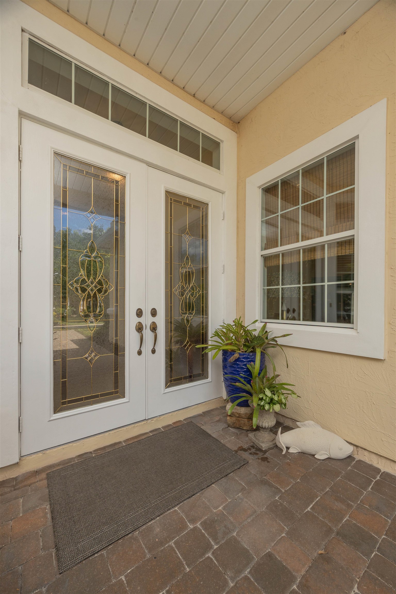 1160 Inverness Drive St. Augustine, FL 32092 - Photo 7 of 77 a front view of a house with a large window