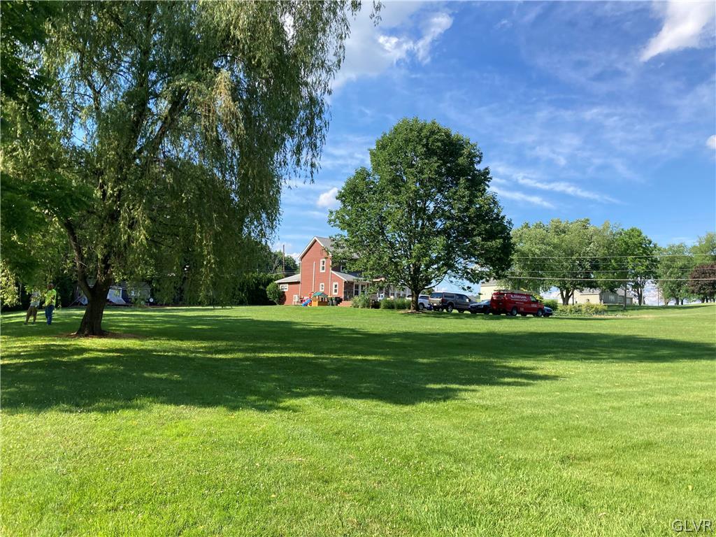 669 South Summit Road Bath, PA 18014 - Photo 39 of 50 a view of a field of grass and trees