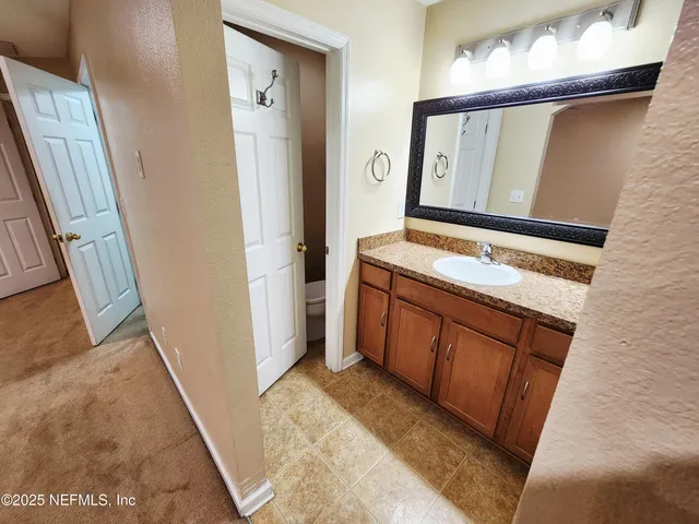 a bathroom with a bathtub and a sink