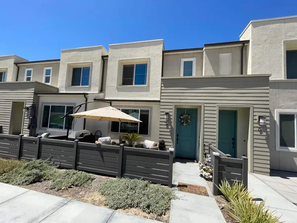 a front view of a house with patio