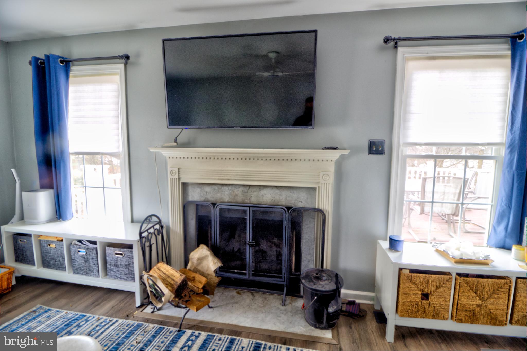 3879 Schroeder Avenue Perry Hall, MD 21128 - Photo 16 of 31 a living room with furniture and a fireplace