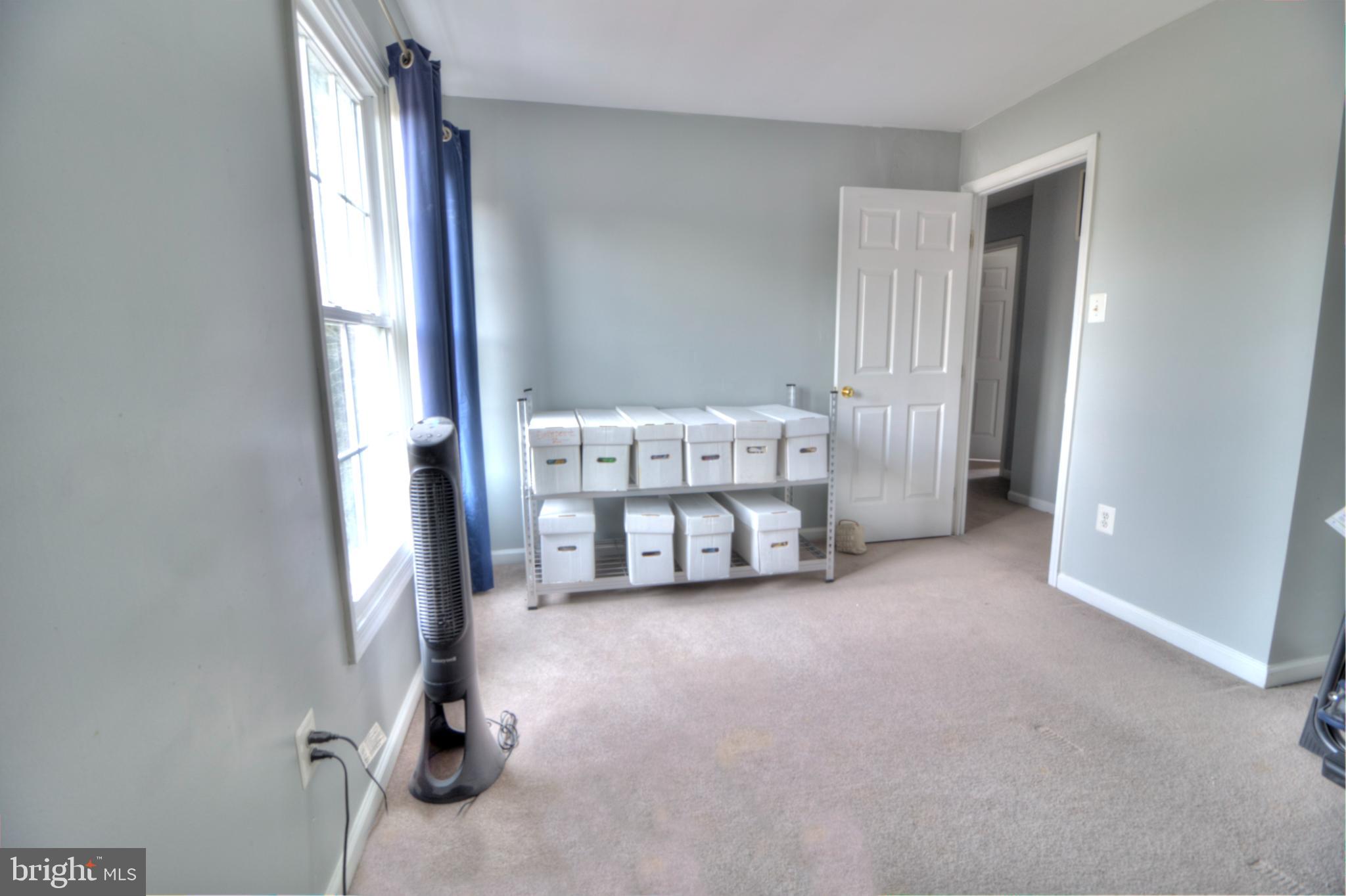 3879 Schroeder Avenue Perry Hall, MD 21128 - Photo 26 of 31 a living room with furniture and a window