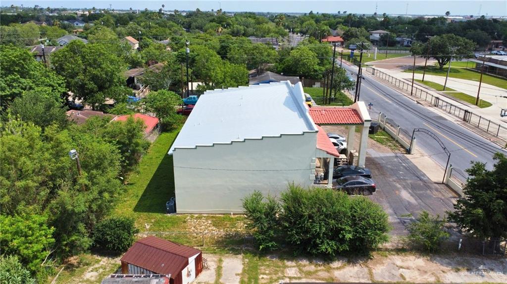 159 North Bridge Avenue Weslaco, TX 78596 - Photo 11 of 19 an aerial view of a house with a garden and lake view