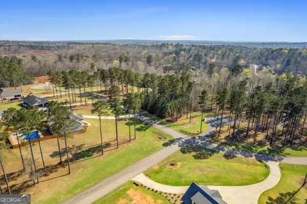 a view of a swimming pool with an ocean view